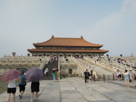 Forbidden City. We are walking under the umbrellas. The sun was unbearable so we had to do something 